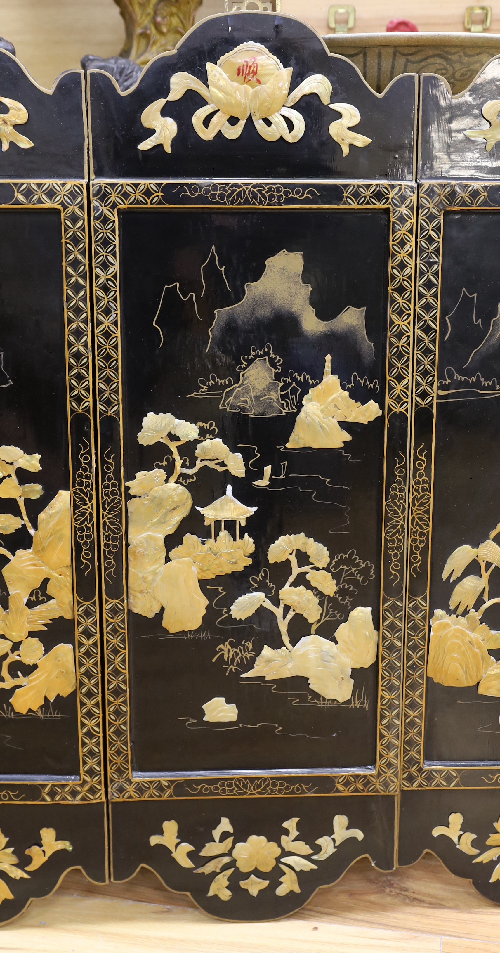 Three Chinese black lacquered, mother of pearl inset and gilt decorated panels, 94cm high